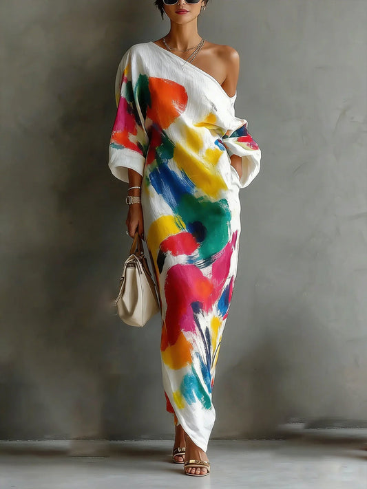 One-shoulder maxi-jurk met lange mouw en contrastprint - vooraanzicht